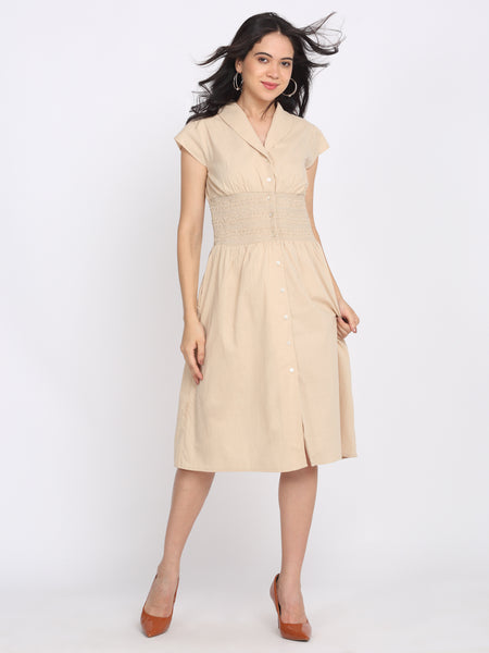 Shaye beige cotton dress shawl collar short cap sleeves button down smocked waist straight hem relaxed fit front view for women