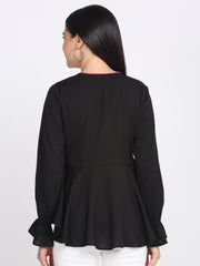 Back view black crinkled crepe peplum top long sleeves relaxed fit asymmetric hem