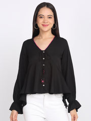 Black peplum top crinkled crepe v-neck full sleeves button down tie up detail with embroidered tassels asymmetric hem relaxed fit front view