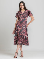 Shaye dusty pink floral print party dress satin styled with strappy sandals relaxed fit full body outfit for women