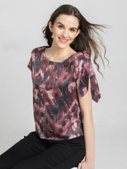 Shaye mauve printed top satin boat neck printed knot shoulder model pose relaxed fit for women