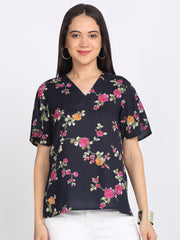 Navy blue floral print viscose rayon top v-neckline short flared sleeves keyhole back side slits curved hem relaxed fit front view