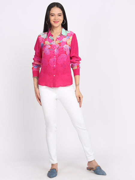 Model in pink floral print button-down shirt, shirt collar, paired with straight white pants—full-body view
