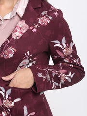 Close-up of Shaye Savy blazer in wine with floral print, notch collar, and relaxed fit – premium satin blazer