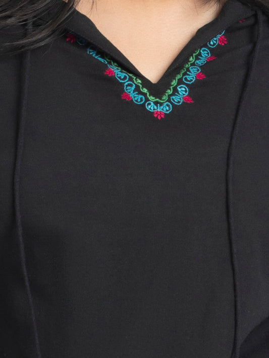 Close up of embroidered V-neckline with tie up detail on black cotton Shiloh Co-ord Set top