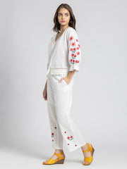 Side profile of Sojourn Co-ord Set highlighting embroidered crop top elasticated waistband and pockets on pants