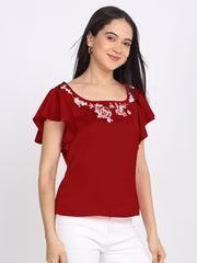 Maroon embroidered satin top front with short flared sleeves, square neck, white embroidery