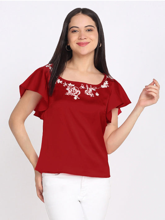 Maroon satin top with square neck, white floral embroidery on neckline, short flared sleeves, curved hem, relaxed fit front view