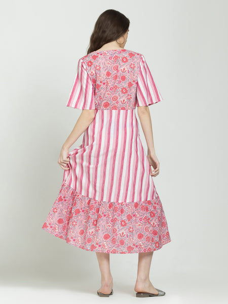 Back view of pink fit and flare cotton dress with floral print skirt, straight hem, concealed zipper